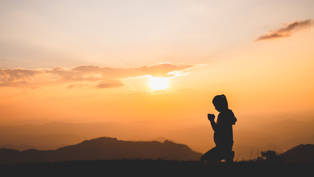 Person experiencing guilt and anxiety during prayer due to Scrupulosity OCD